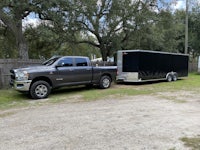 the trailer is parked on the side of the road